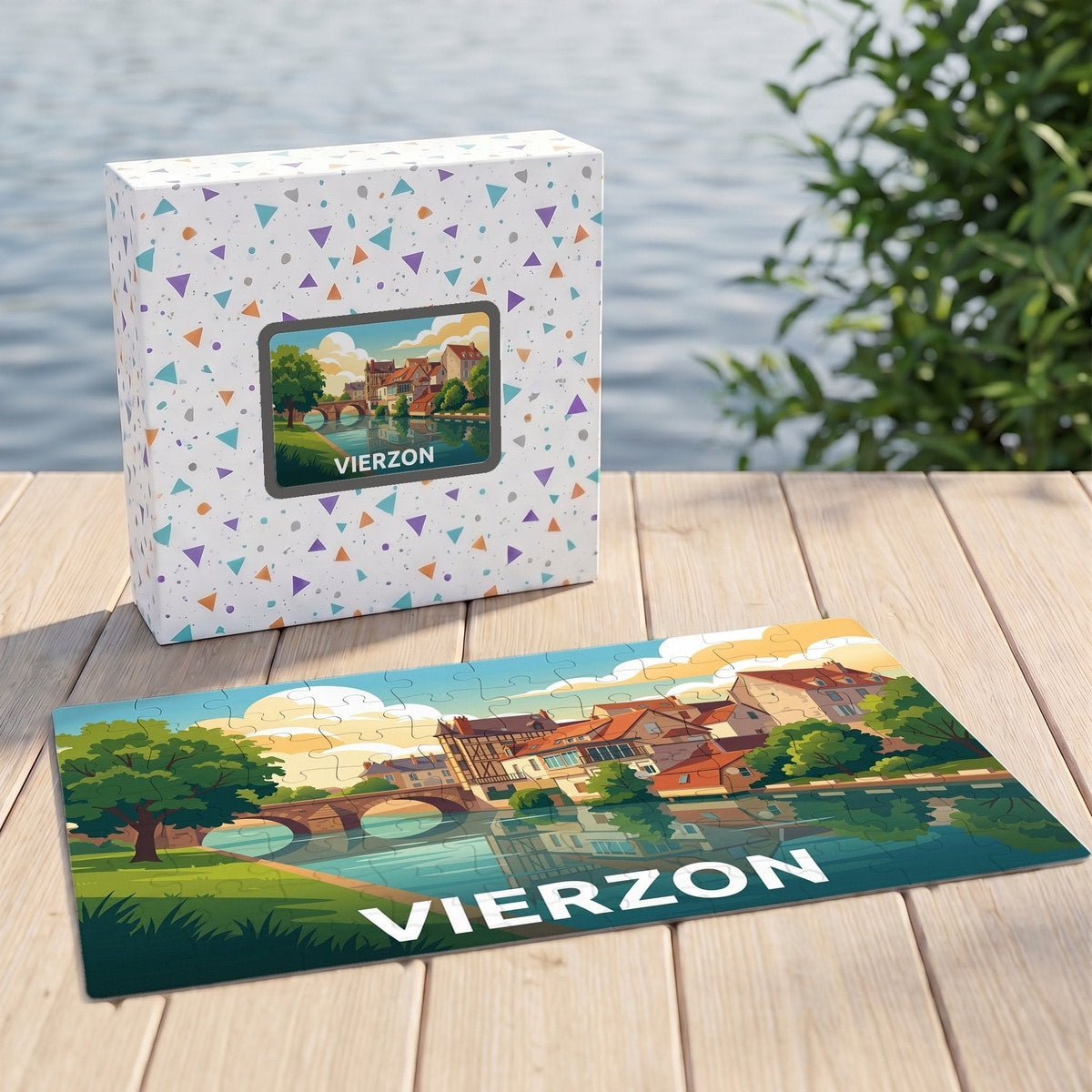 Puzzle souvenir de la ville de Vierzon avec une illustration colorée représentant un pont et des maisons en bord de rivière.