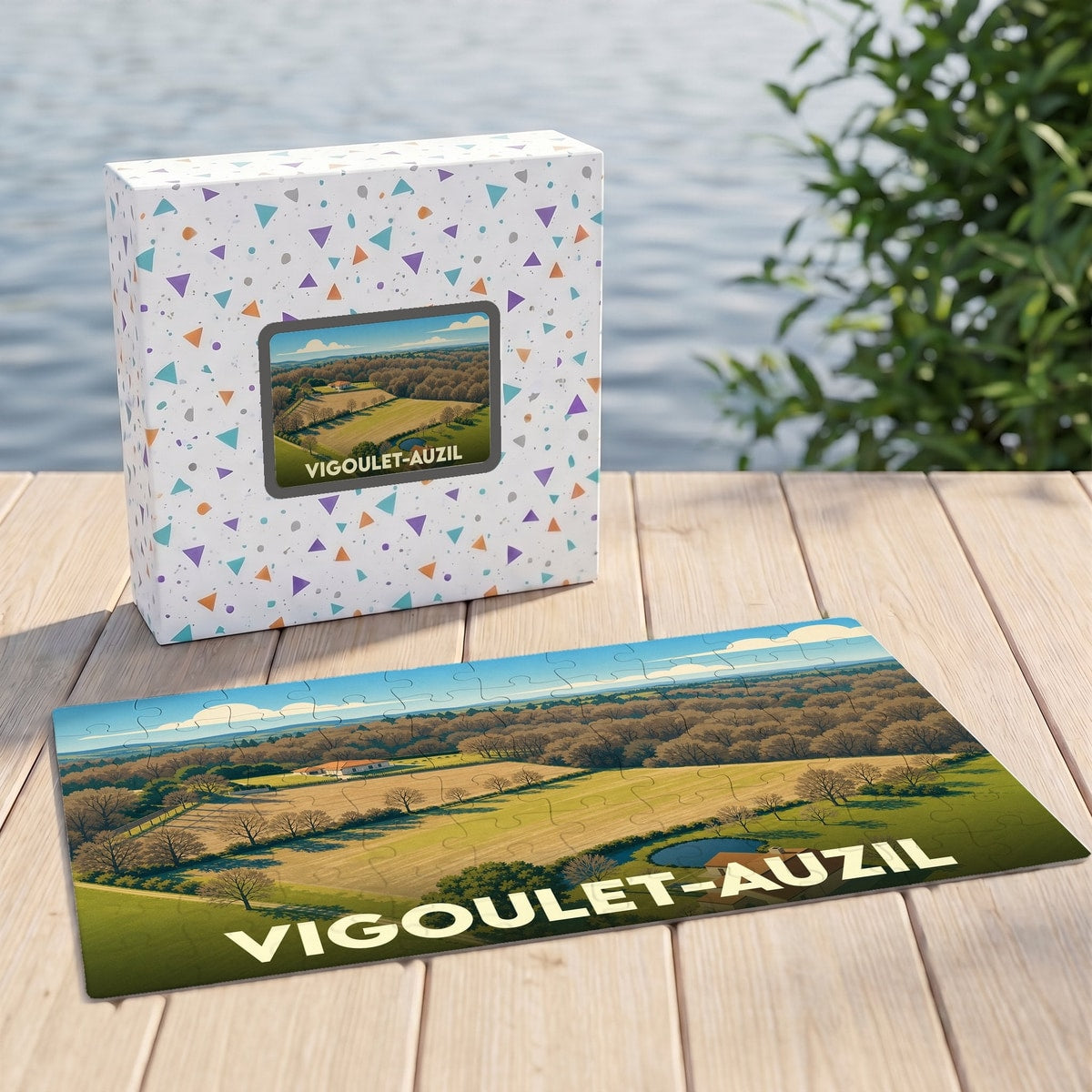 Puzzle souvenir de la ville de Vigoulet-Auzil avec une illustration de paysage champêtre.
