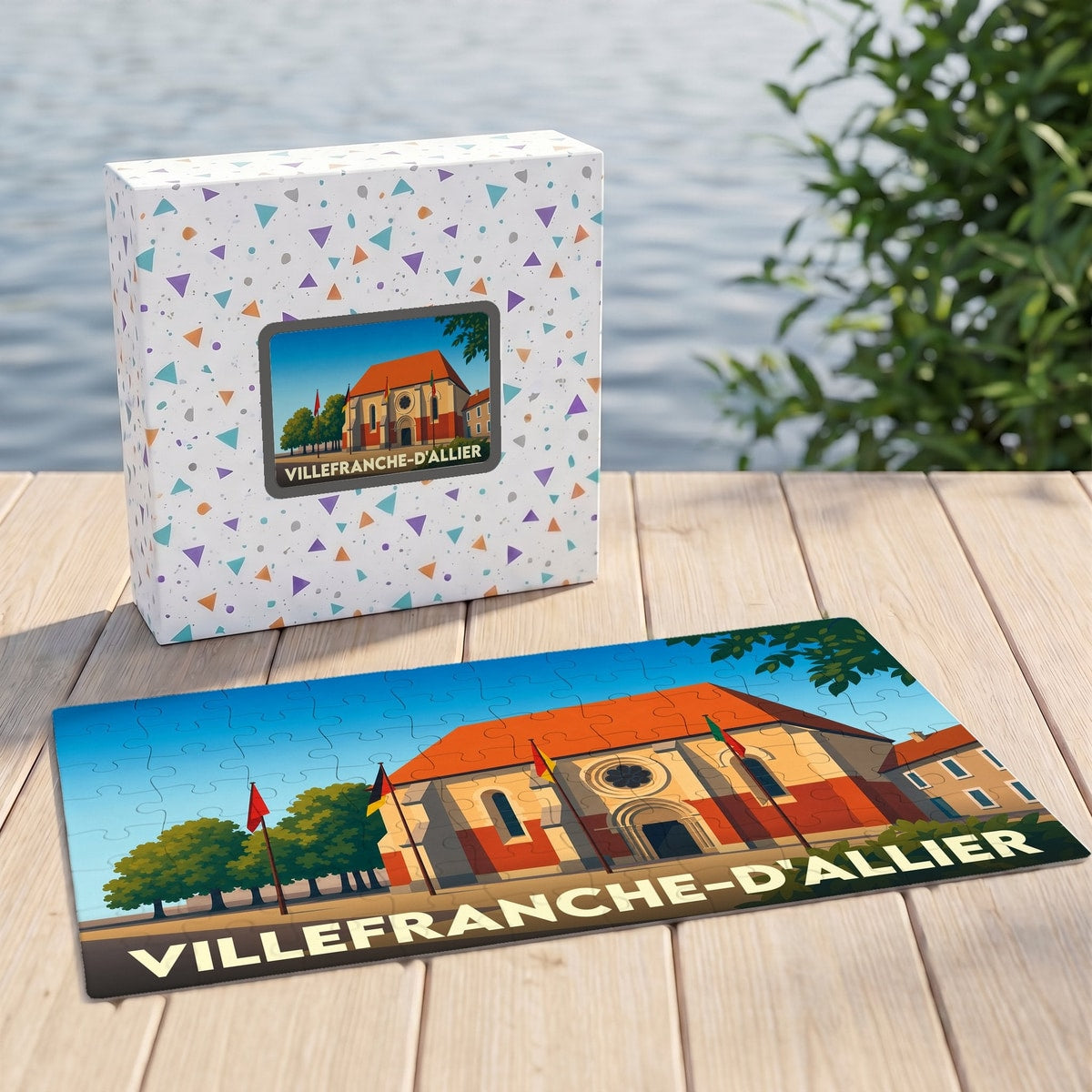 Puzzle souvenir de la ville de Villefranche-d'Allier avec une illustration stylisée et sa boîte assortie.