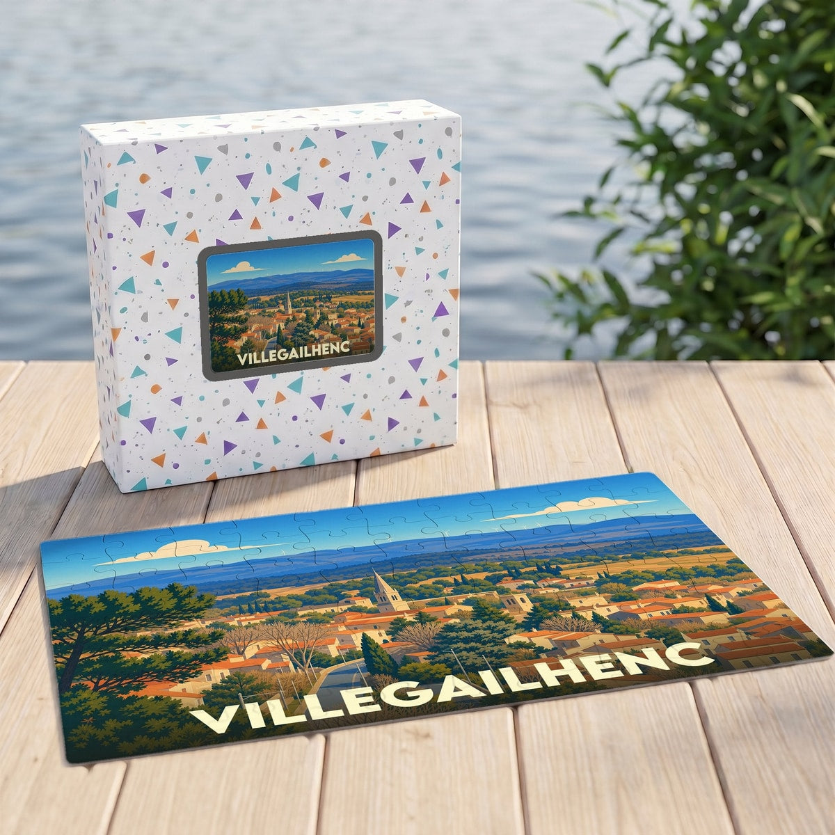 Puzzle souvenir de la ville de Villegailhenc avec une illustration paysagère colorée.