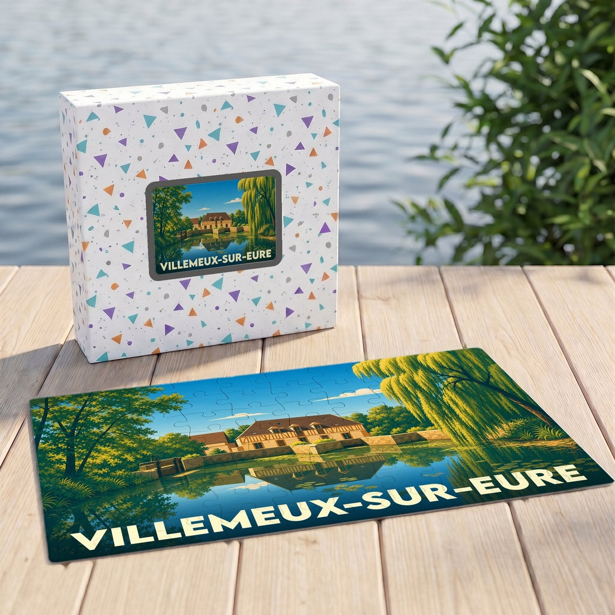 Puzzle souvenir de Villemeux-sur-Eure avec son illustration de moulin au bord de l'eau.