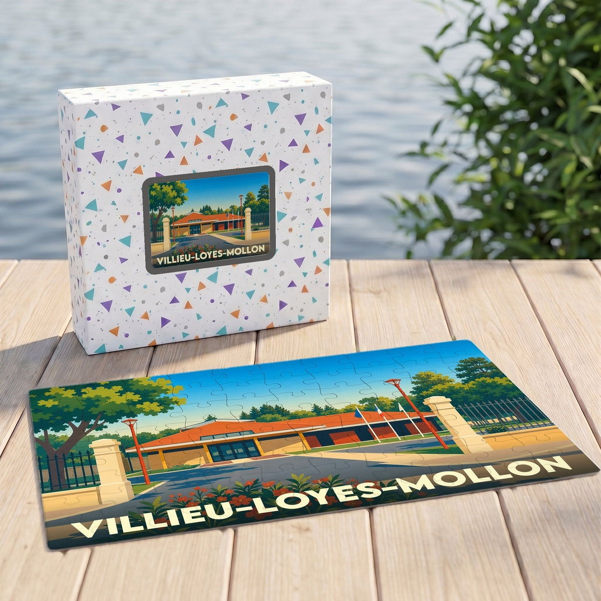 Puzzle souvenir de la ville de Villieu-Loyes-Mollon avec son coffret illustré.