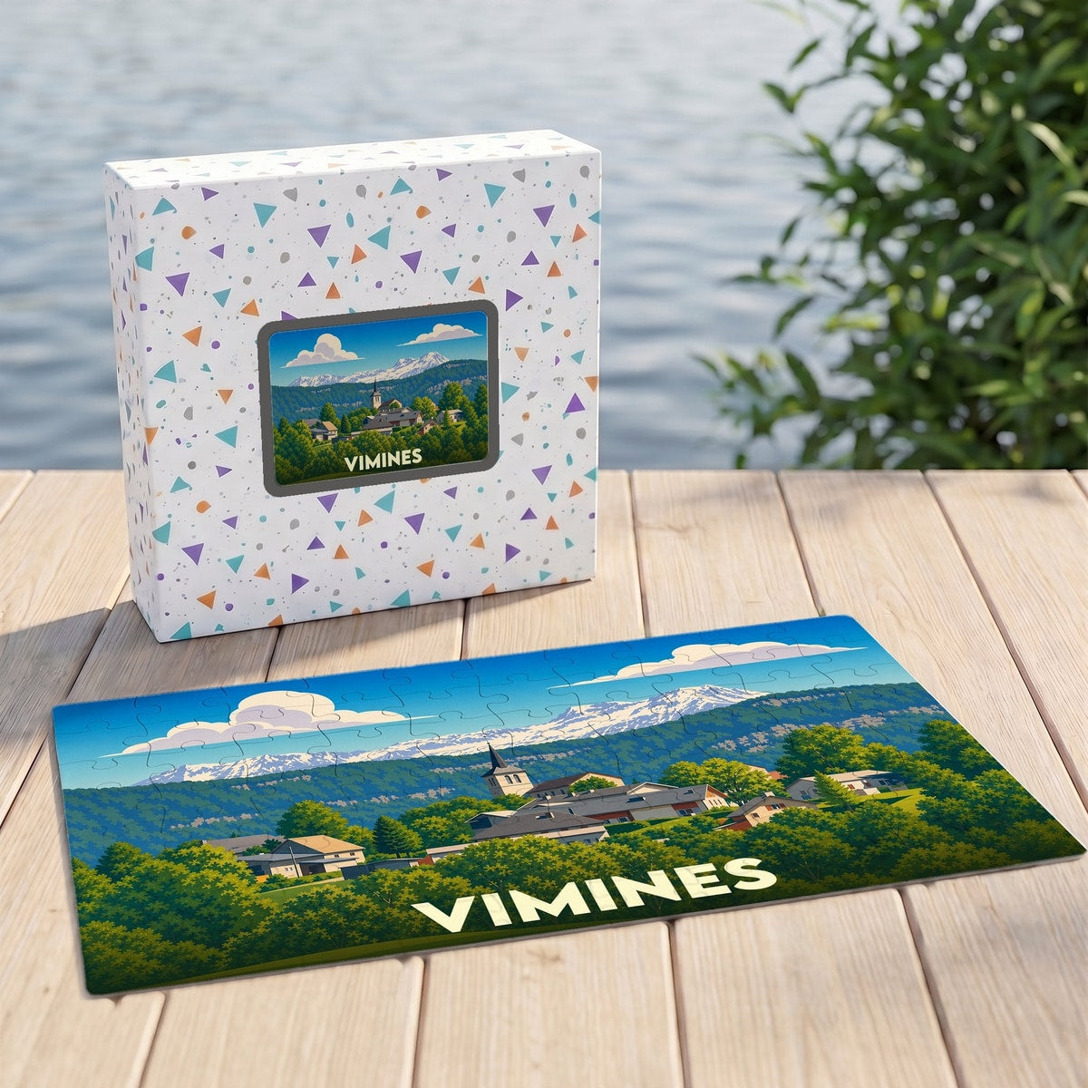 Puzzle souvenir de la ville de Vimines avec une illustration de paysage de montagne et son coffret assorti.