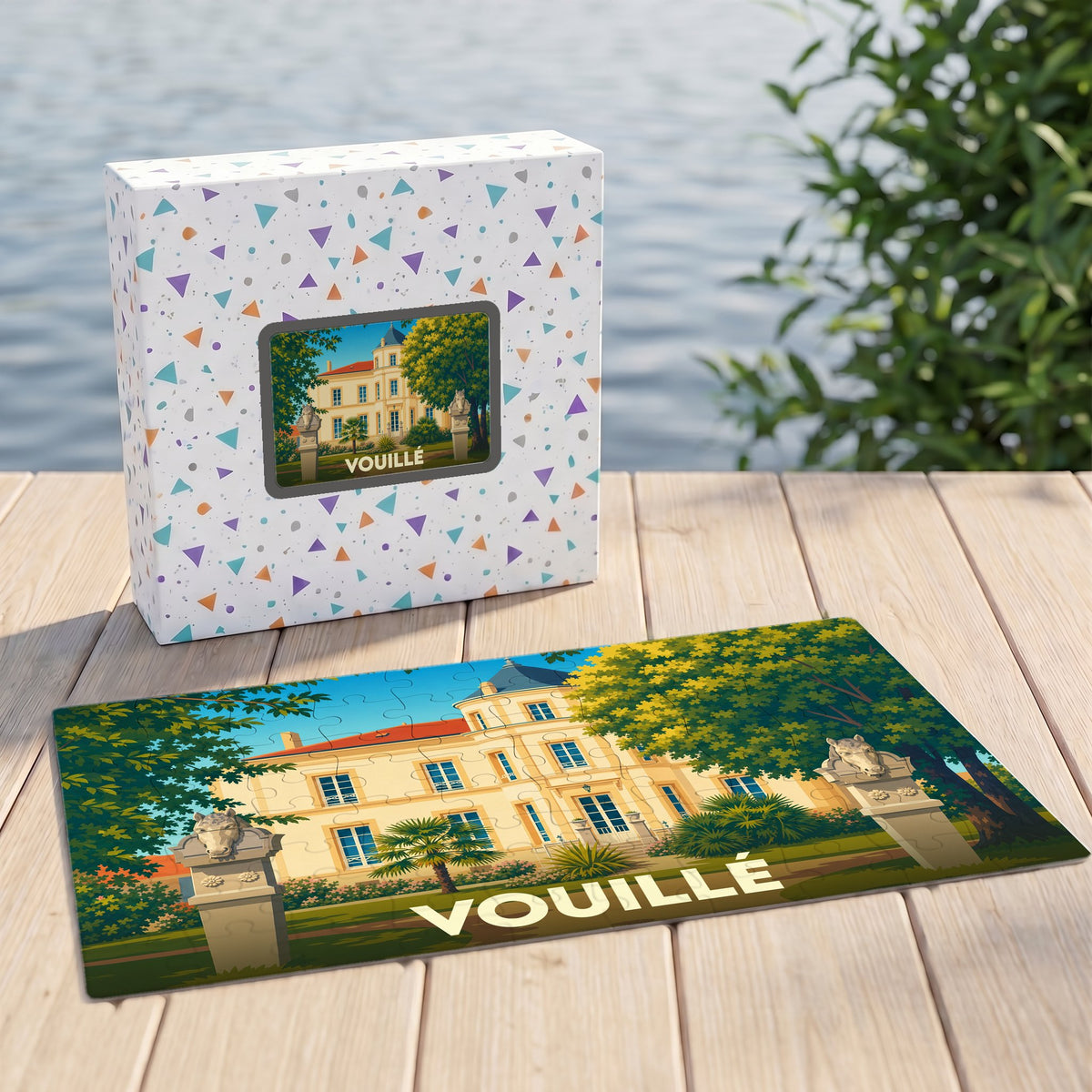 Puzzle souvenir de la ville de Vouillé avec une illustration stylisée d'un manoir.