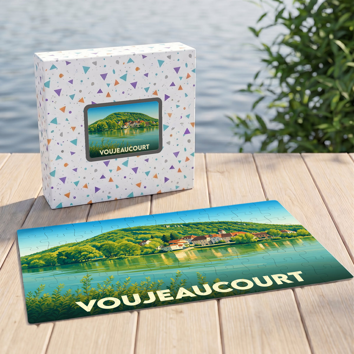 Puzzle souvenir de la ville de Voujeaucourt avec une illustration stylisée d'un paysage de bord de l'eau.