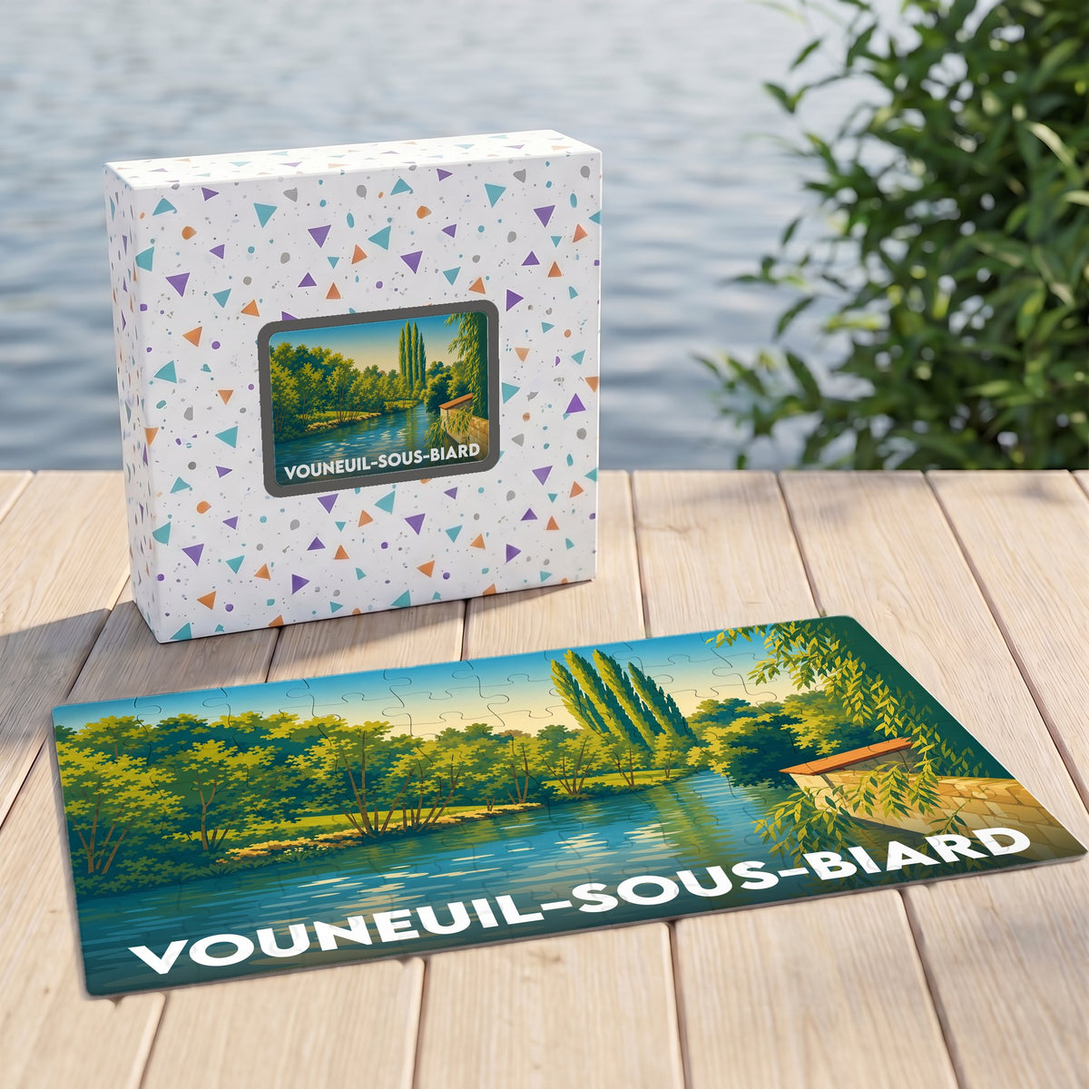 Puzzle souvenir de la ville de Vouneuil-sous-Biard représentant un paysage de rivière illustré.