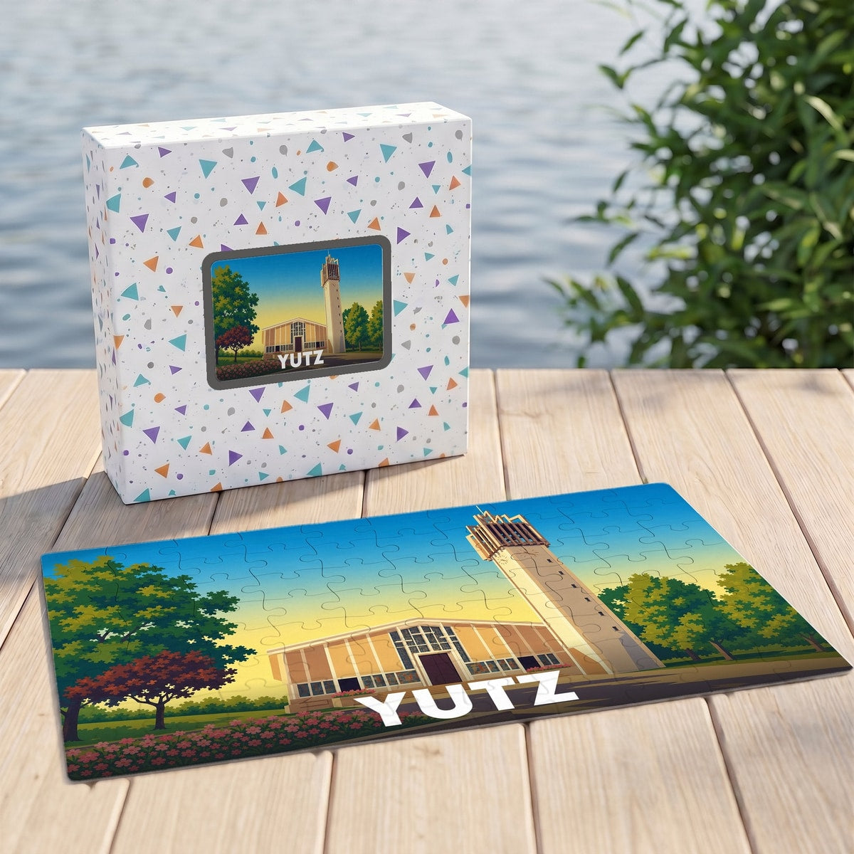 Puzzle souvenir de la ville de Yutz illustrant son église et son clocher dans un style graphique épuré.