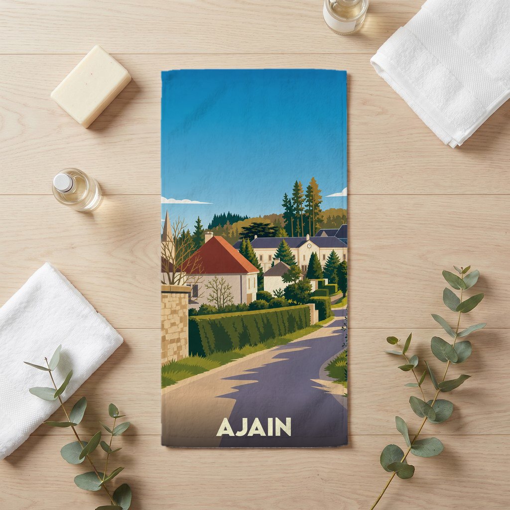 Serviette de bain souvenir de la ville d'Ajain avec une illustration de paysage stylisée.