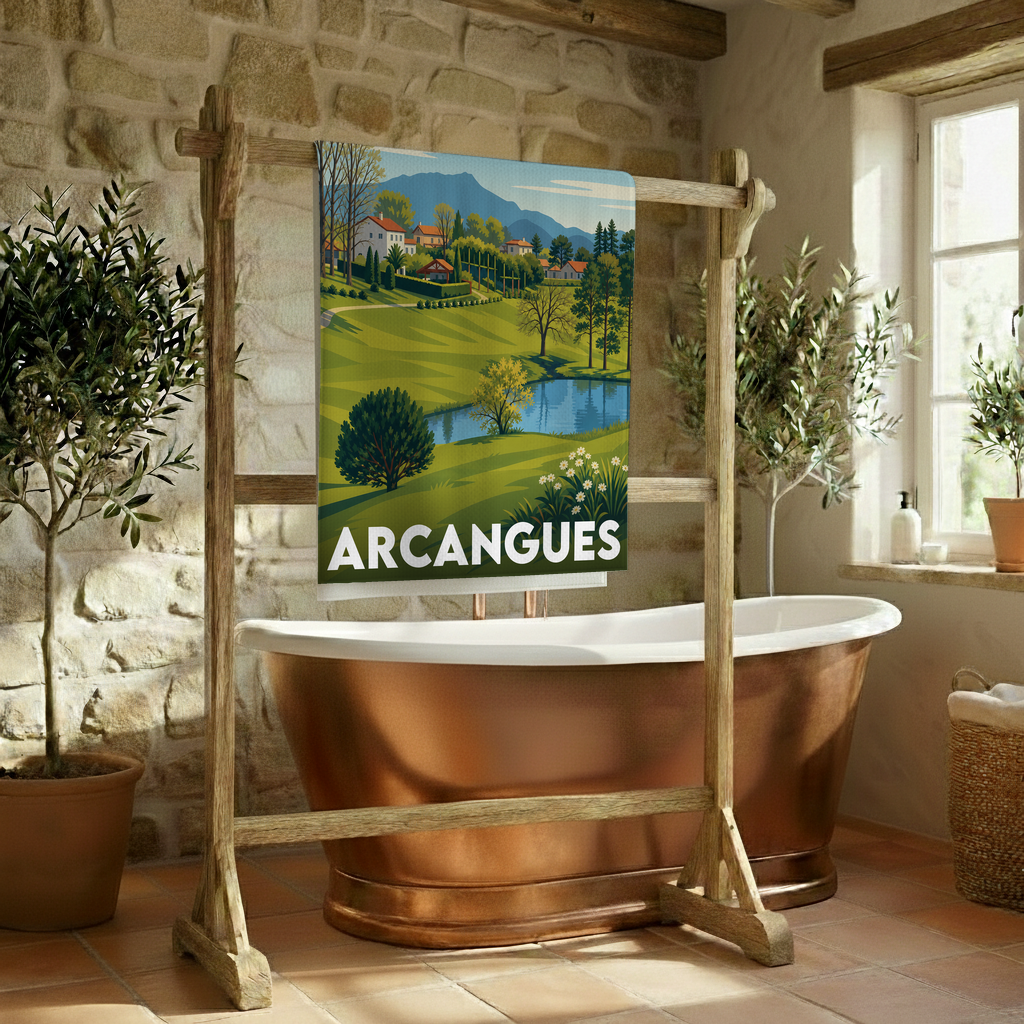 Serviette de bain souvenir de la ville d'Arcangues avec une illustration de paysage stylisée.