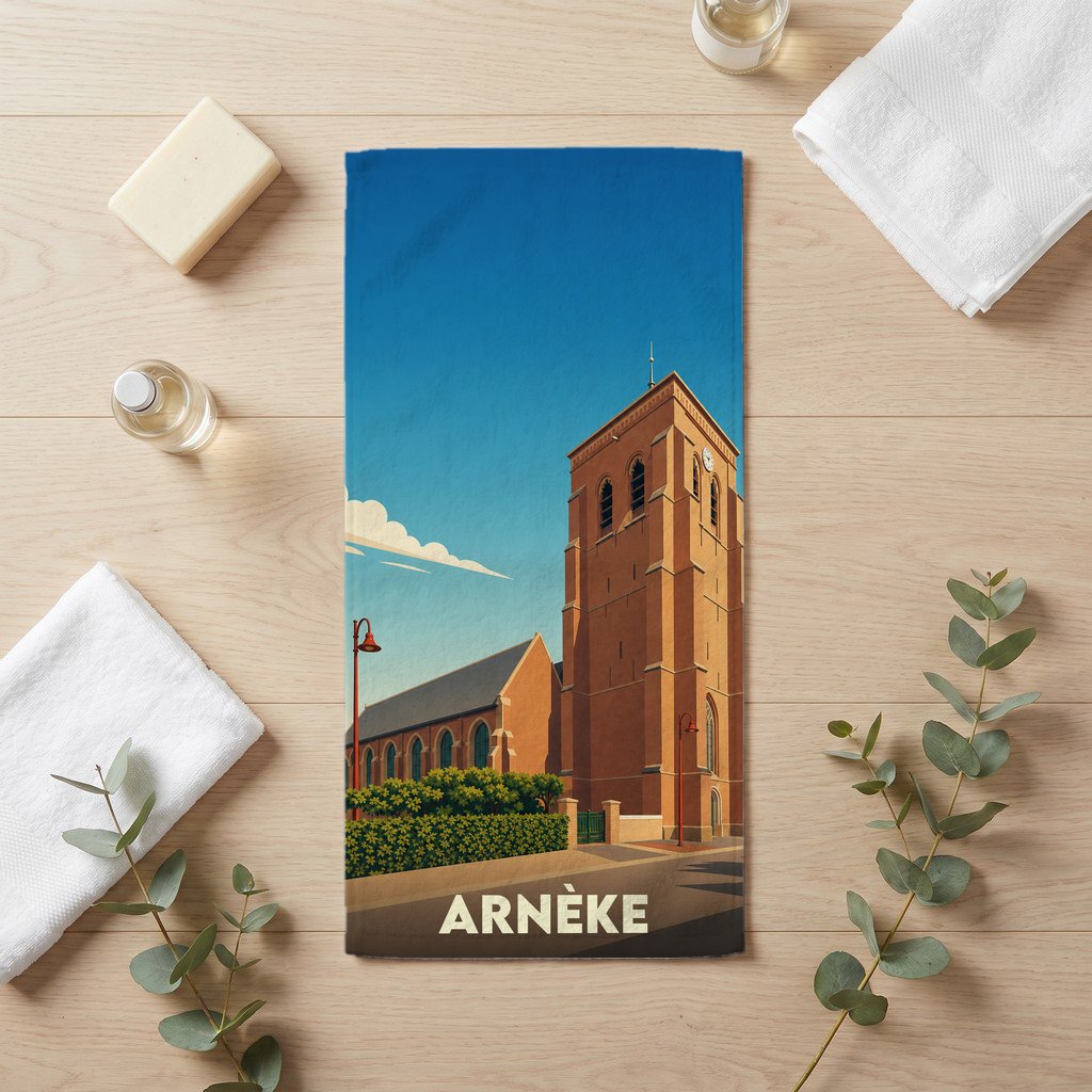 Serviette de bain souvenir de la ville d'Arnèke avec une illustration stylisée de son église.