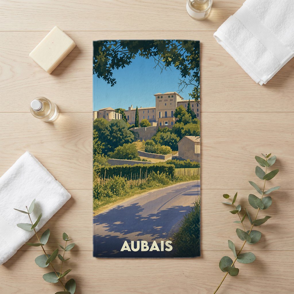 Serviette de bain souvenir de la ville d'Aubais avec une illustration paysagère stylisée.