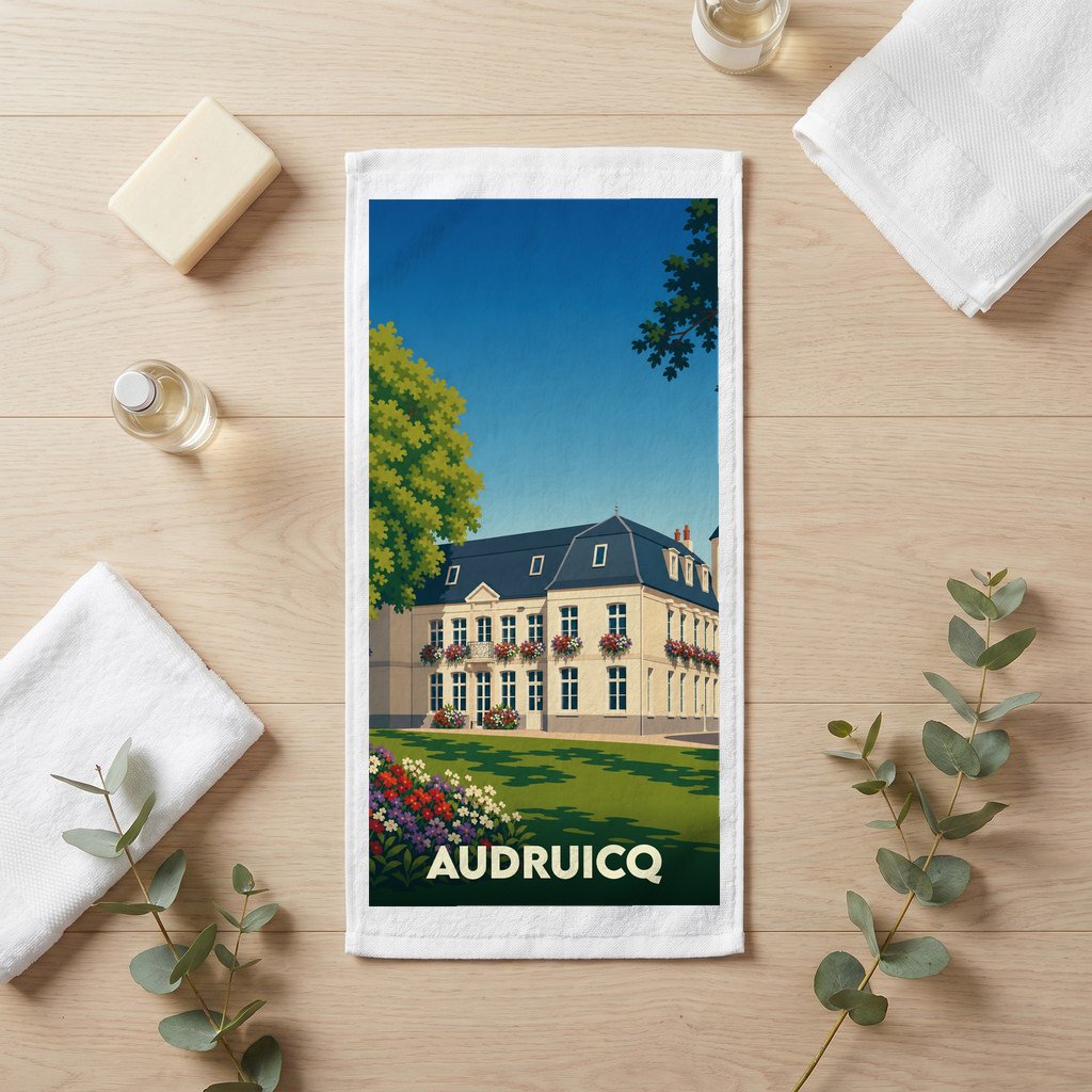 Serviette de bain souvenir de la ville d'Audruicq avec une illustration stylisée de son hôtel de ville.
