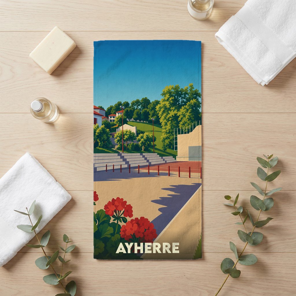 Serviette de bain souvenir de la ville d'Ayherre avec une illustration stylisée d'un fronton basque.