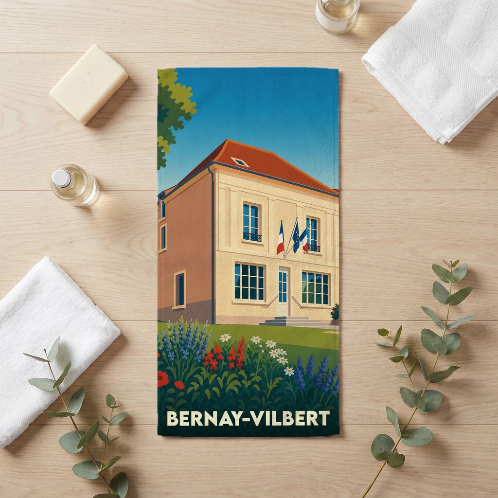 Serviette de bain souvenir de la ville de Bernay-Vilbert avec une illustration stylisée d'un bâtiment officiel.