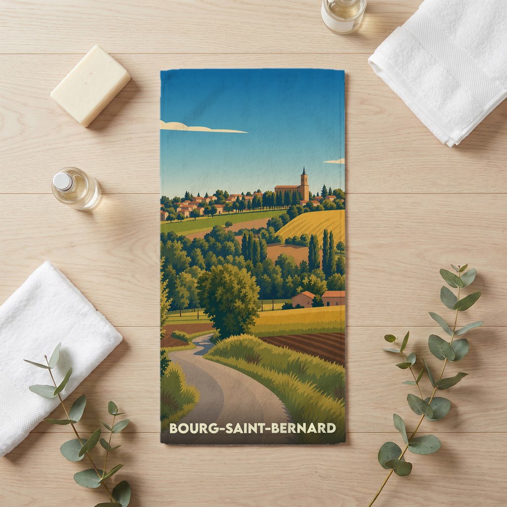Serviette de bain souvenir de la ville de Bourg-Saint-Bernard avec une illustration stylisée d'un paysage de campagne.