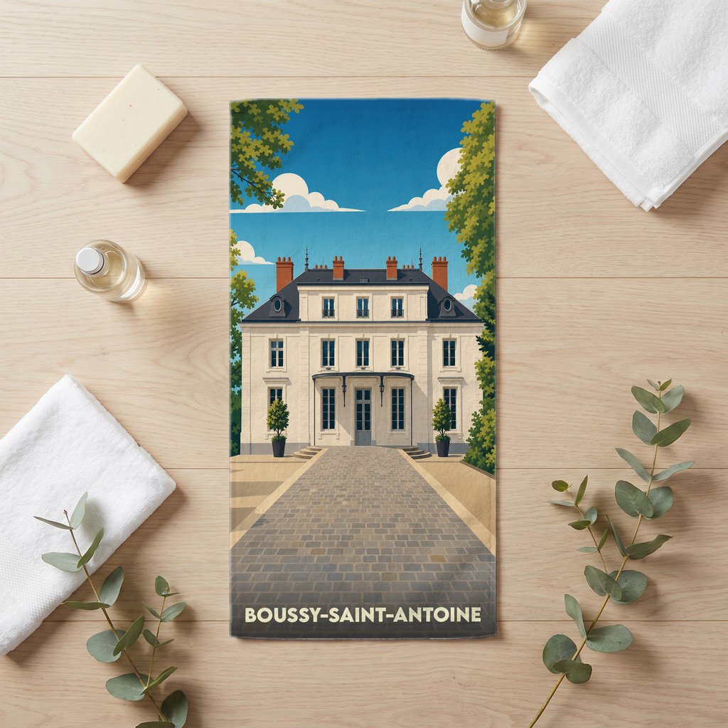 Serviette de bain souvenir de la ville de Boussy-Saint-Antoine avec une illustration stylisée d'une demeure bourgeoise.
