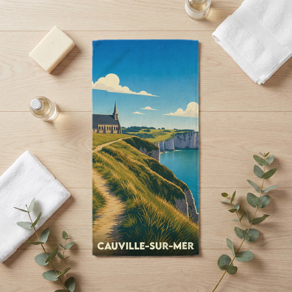 Serviette de bain souvenir de la ville de Cauville-sur-Mer avec une illustration stylisée des falaises et de l'église.