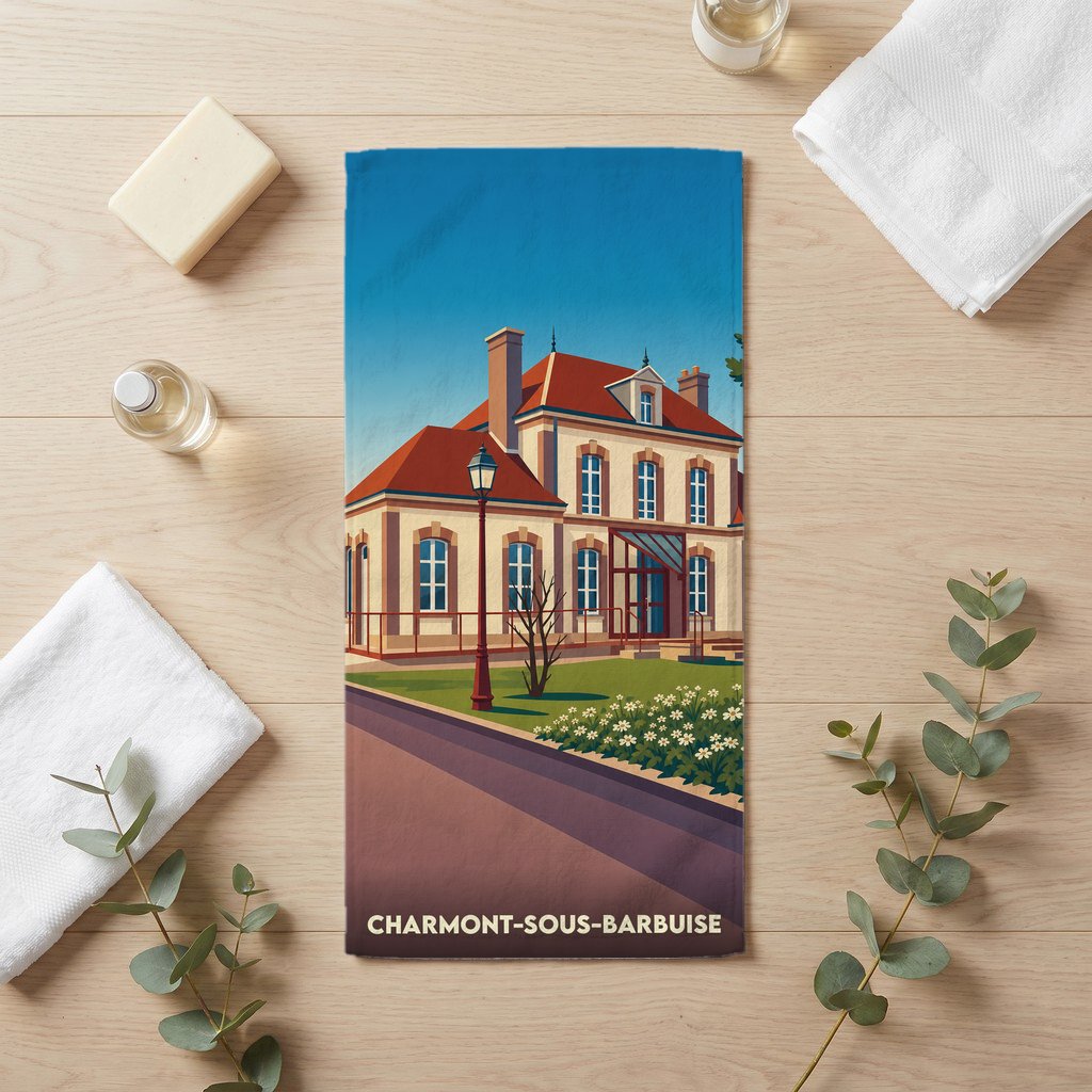 Serviette de bain souvenir de la ville de Charmont-sous-Barbuise avec une illustration stylisée.
