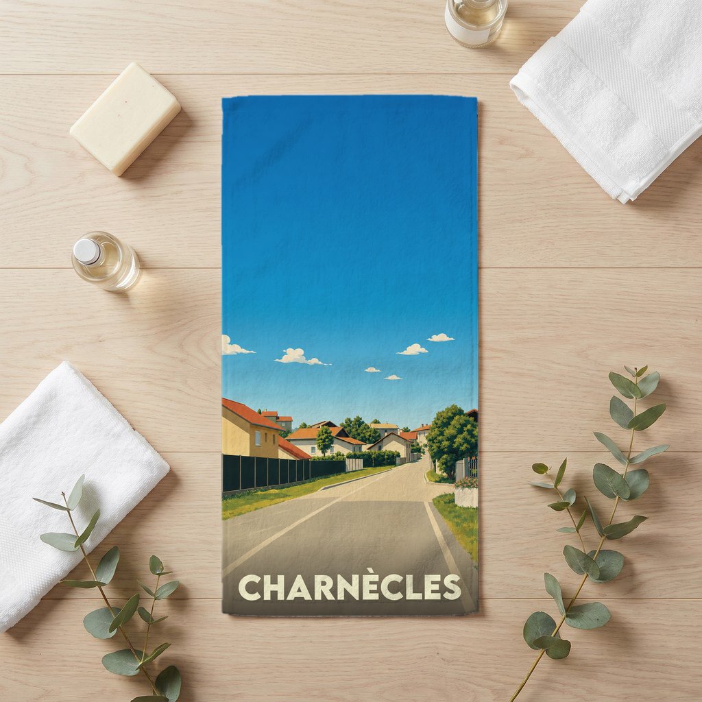 Serviette de bain souvenir de la ville de Charnècles avec une illustration stylisée d'un paysage urbain.
