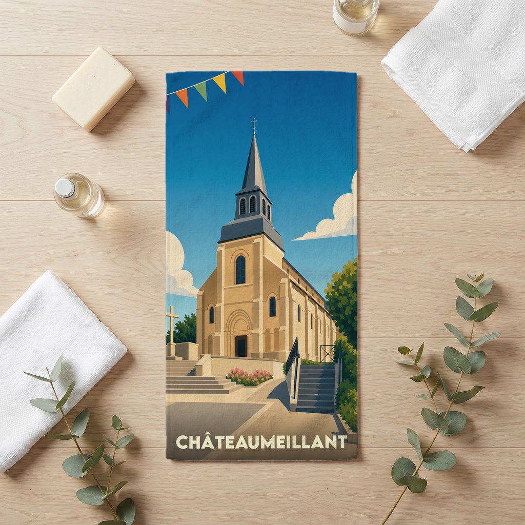 Serviette de bain souvenir de la ville de Châteaumeillant avec une illustration stylisée de son église sous un ciel bleu.