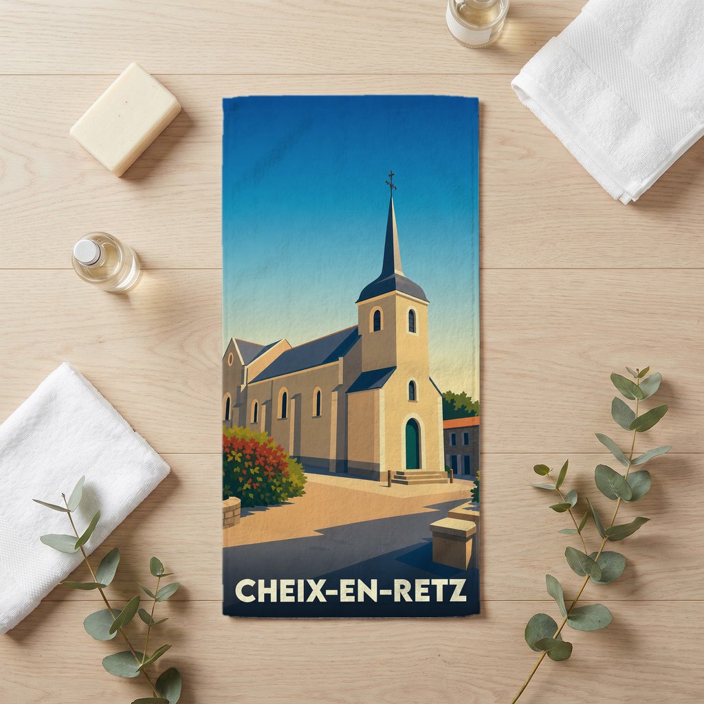 Serviette de bain souvenir de la ville de Cheix-en-Retz avec une illustration stylisée de son église.