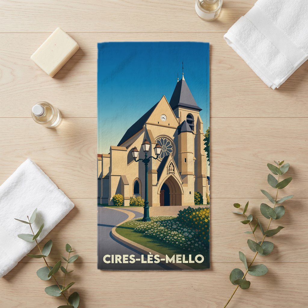 Serviette de bain souvenir de la ville de Cires-lès-Mello avec une illustration stylisée de son église.