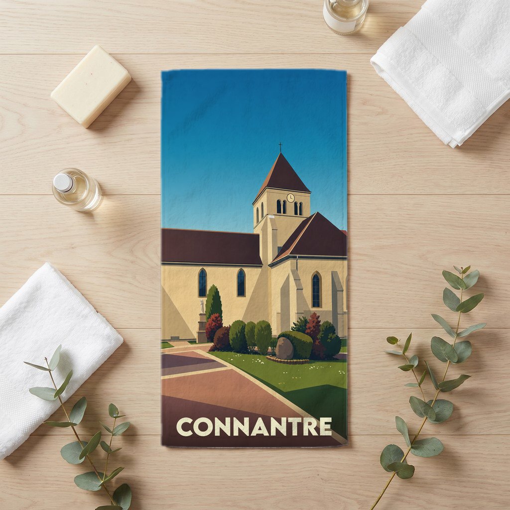 Serviette de bain souvenir de la ville de Connantre avec une illustration stylisée de son église.