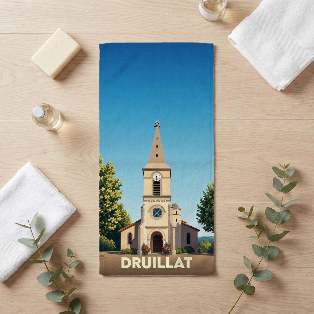 Serviette de bain souvenir de la ville de Druillat avec une illustration stylisée de son église.