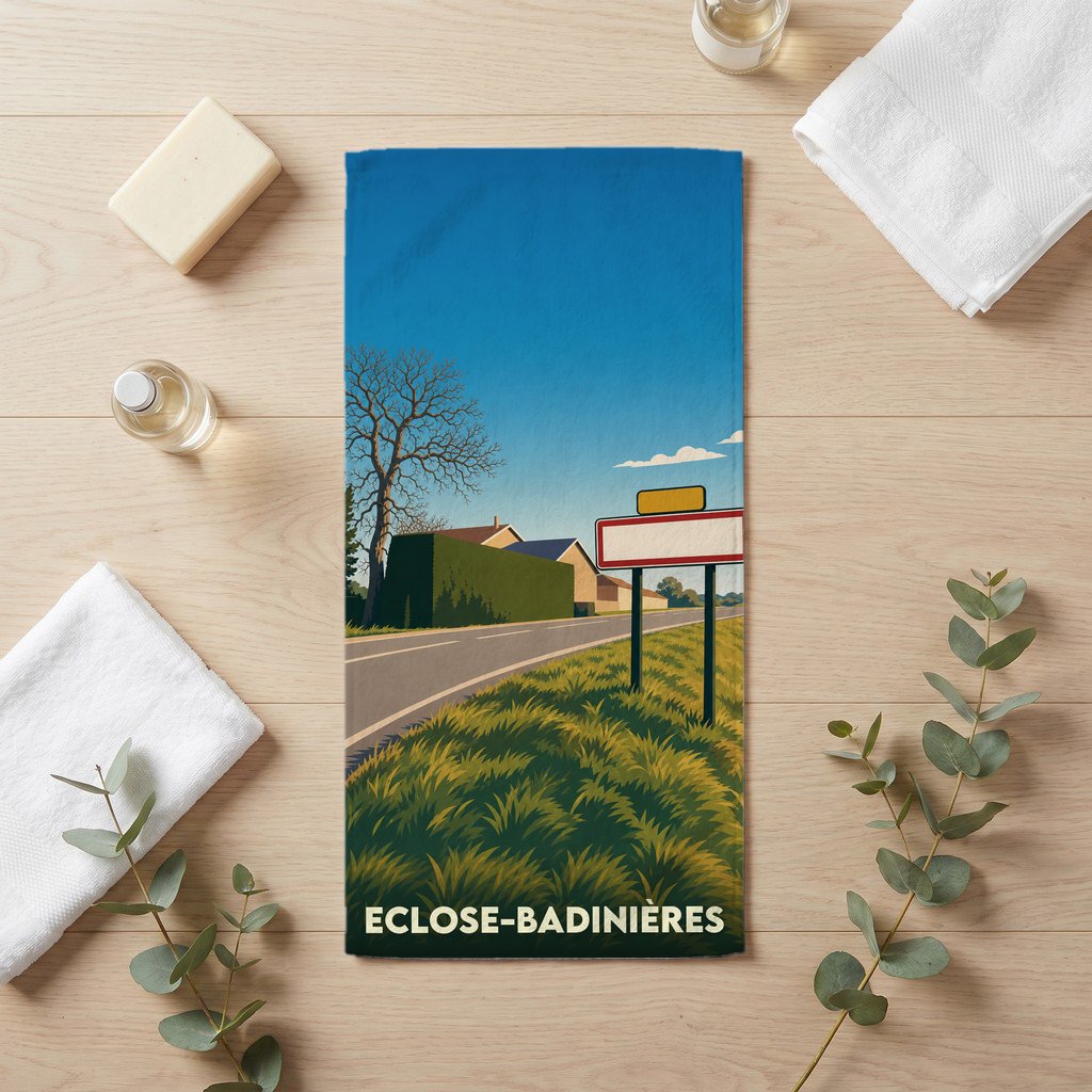 Serviette de bain souvenir de la ville d'Eclose-Badinières avec une illustration stylisée de paysage.