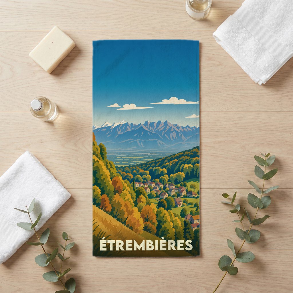 Serviette de bain souvenir de la ville d'Étrembières avec une illustration de paysage de montagne.
