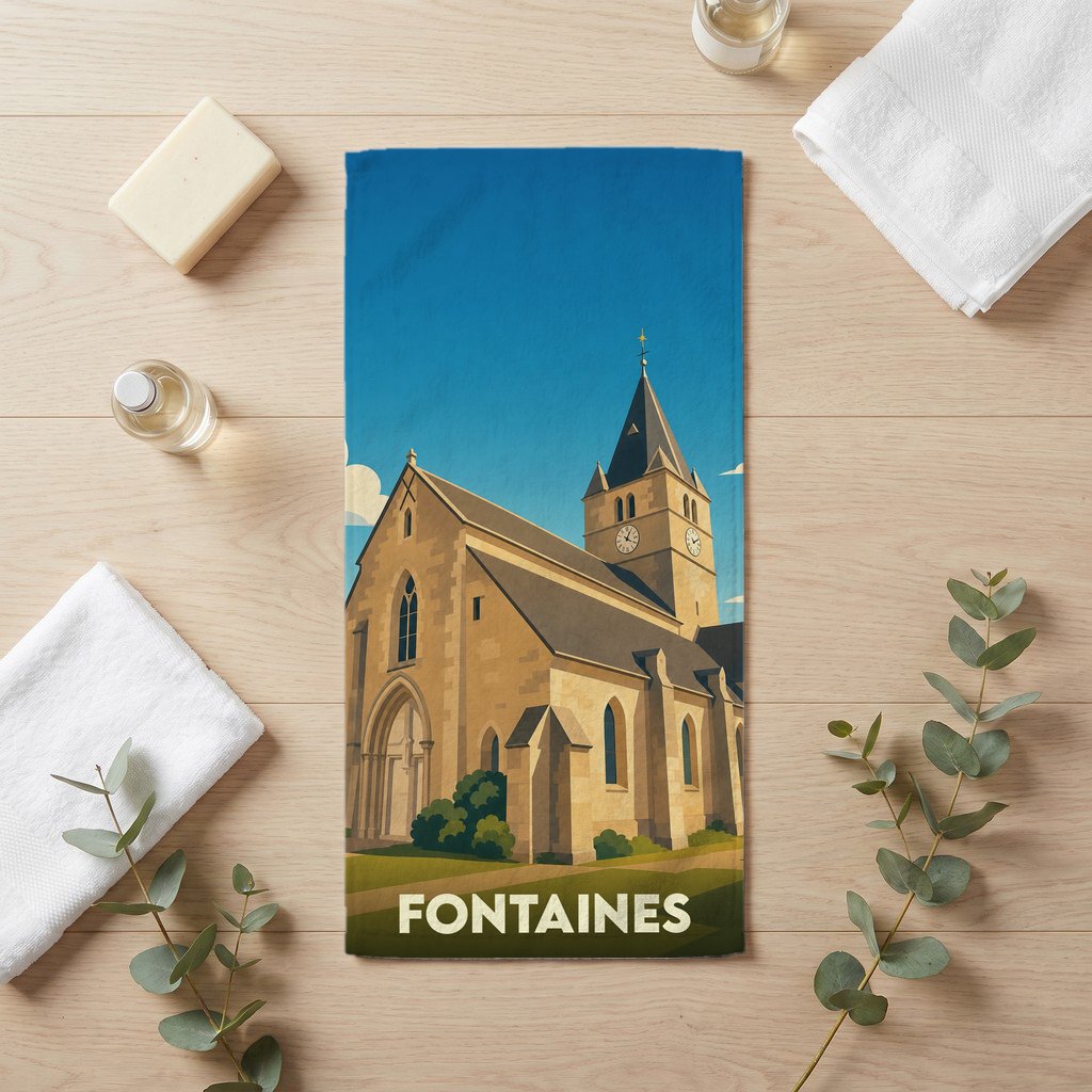 Serviette de bain souvenir de la ville de Fontaines avec une illustration stylisée de son église.