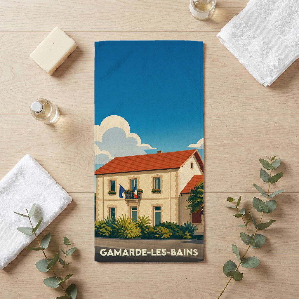 Serviette de bain souvenir de la ville de Gamarde-les-Bains avec une illustration stylisée.