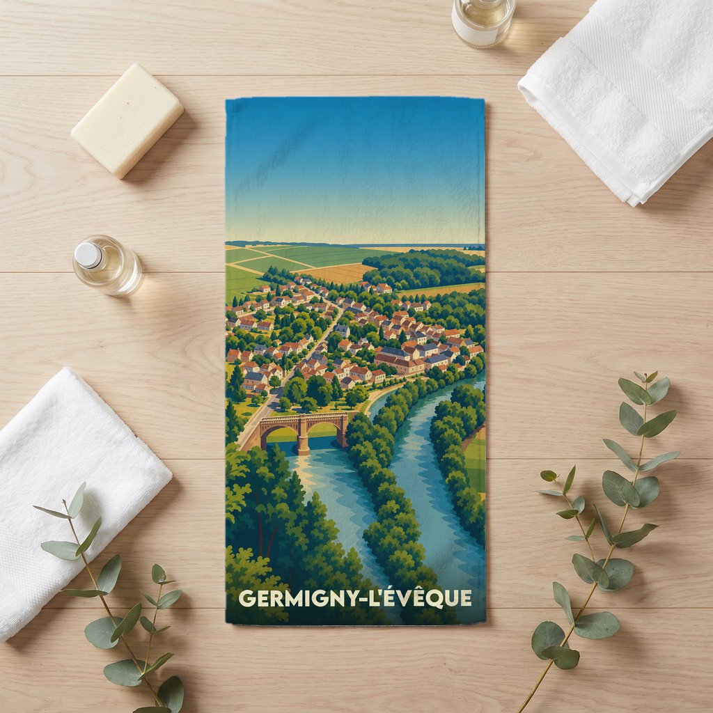 Serviette de bain souvenir de la ville de Germigny-l'Évêque avec une illustration stylisée.