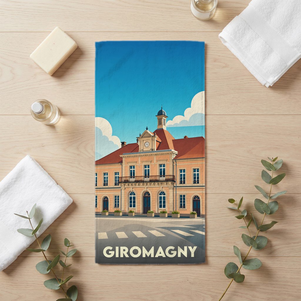 Serviette de bain souvenir de la ville de Giromagny avec une illustration stylisée de son hôtel de ville.