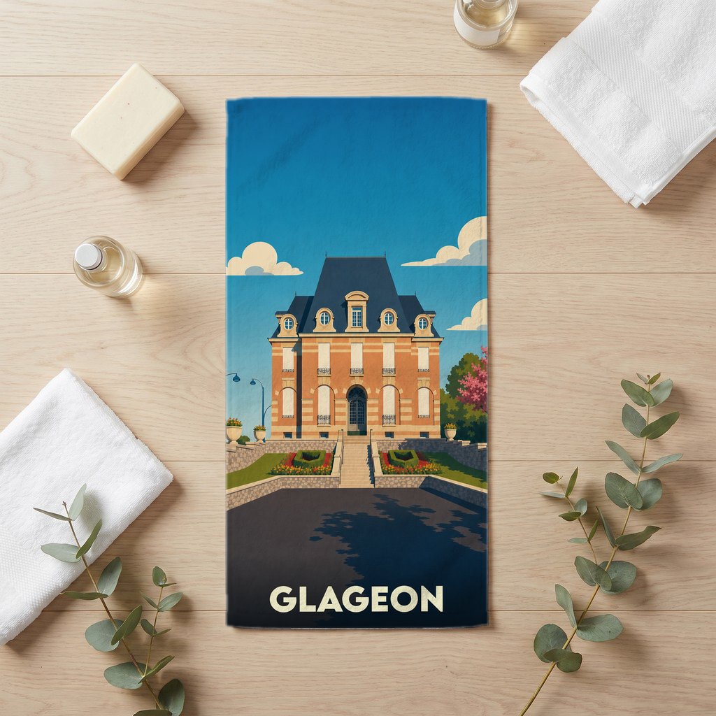 Serviette de bain souvenir de la ville de Glageon avec une illustration stylisée de son hôtel de ville.