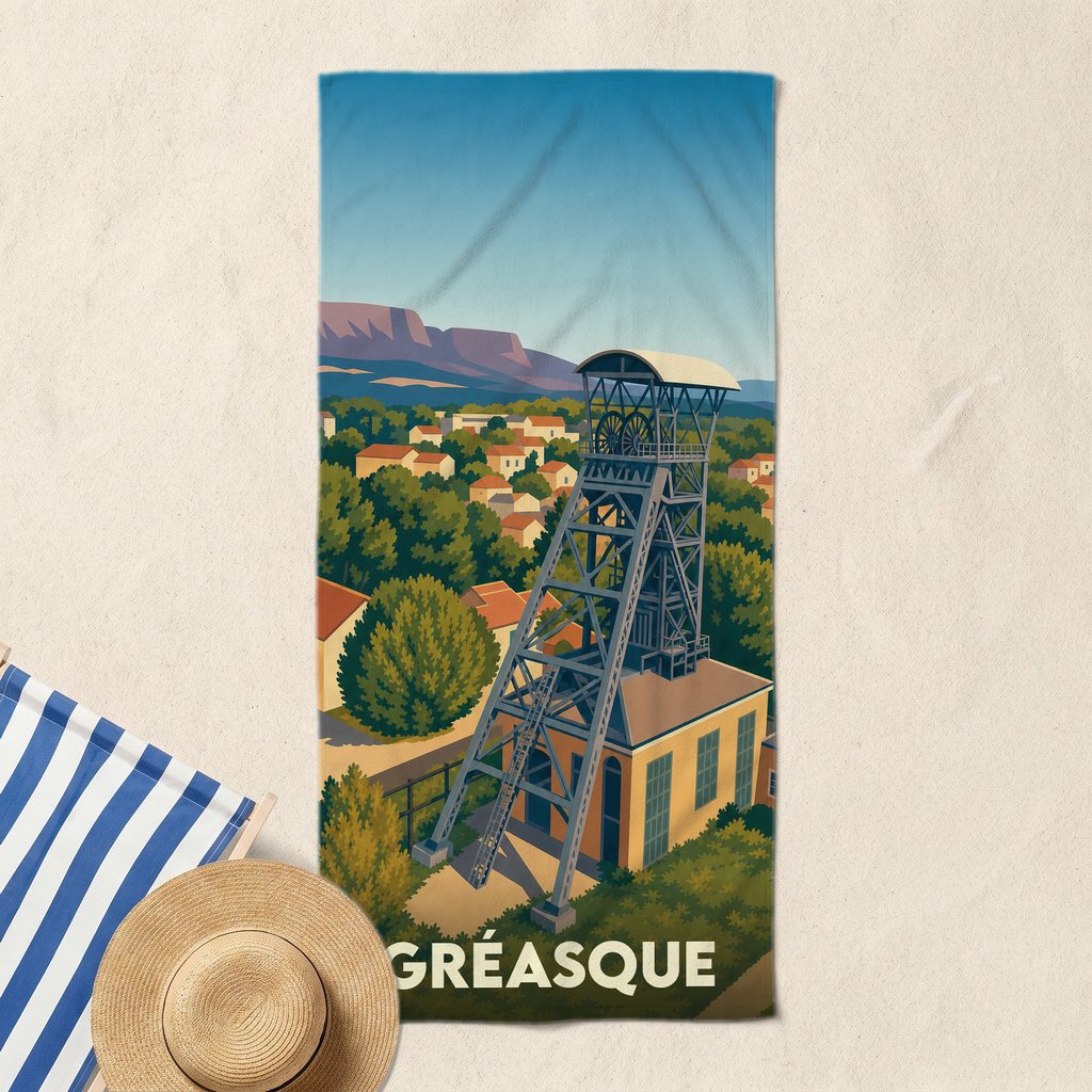 Serviette de bain souvenir de la ville de Gréasque avec une illustration stylisée de son puits de mine.