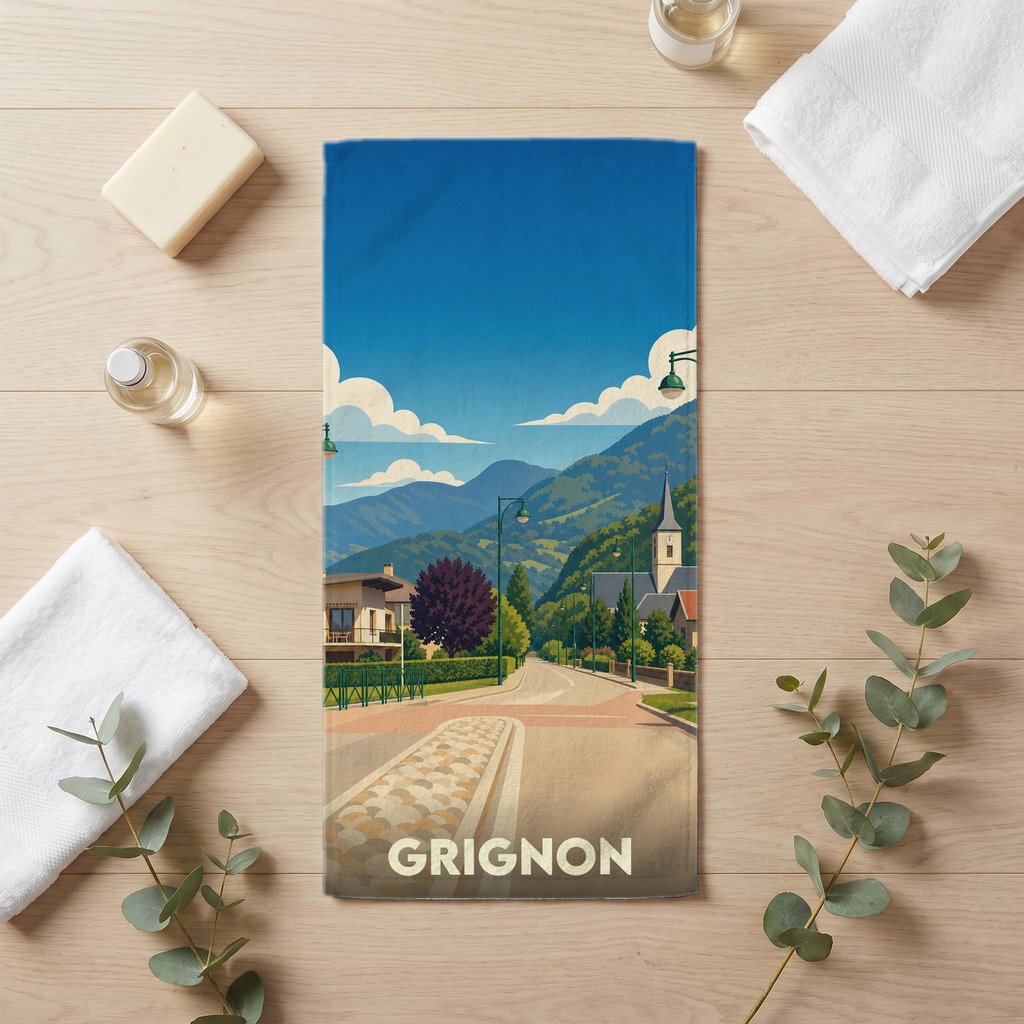 Serviette de bain souvenir de la ville de Grignon avec une illustration stylisée de son paysage montagneux.