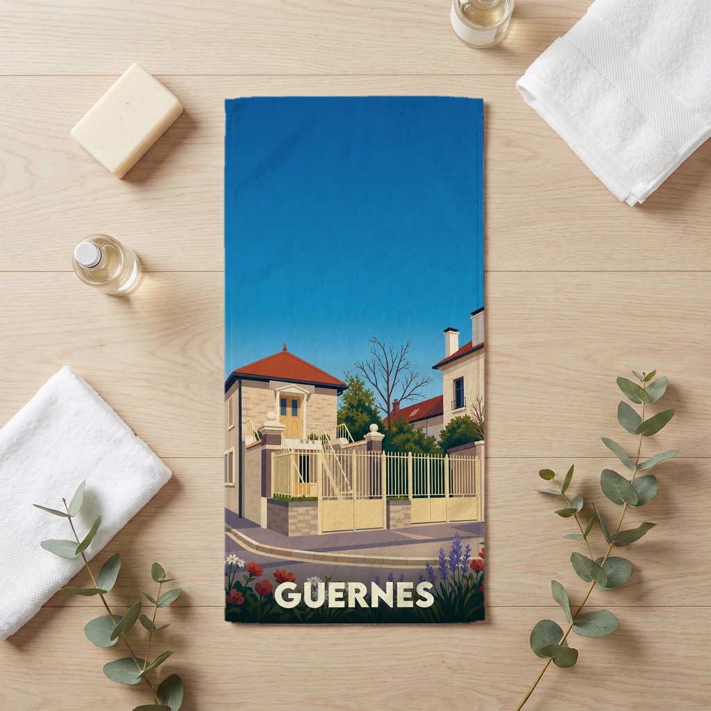 Serviette de bain souvenir de la ville de Guernes avec une illustration stylisée.
