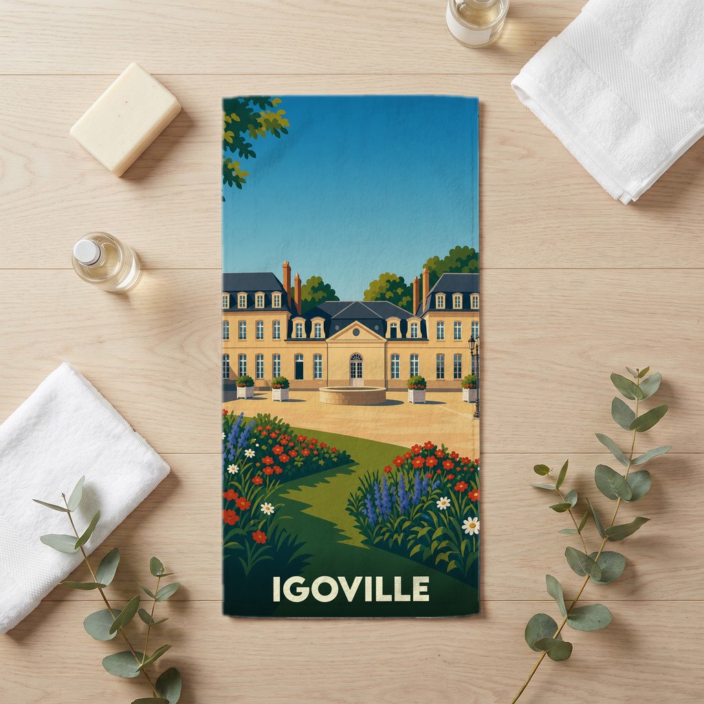 Serviette de bain souvenir de la ville d'Igoville ornée d'une illustration stylisée de son château et de ses jardins.