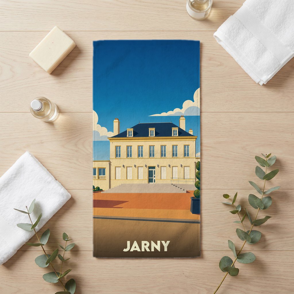 Serviette de bain souvenir de la ville de Jarny avec une illustration stylisée d'un bâtiment remarquable.
