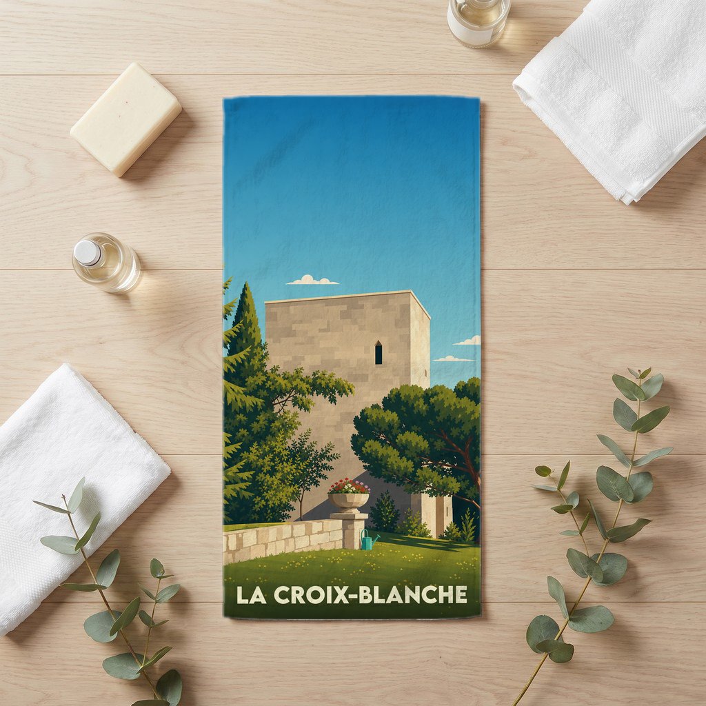Serviette de bain souvenir de la ville de La Croix-Blanche avec une illustration stylisée d'un bâtiment historique.