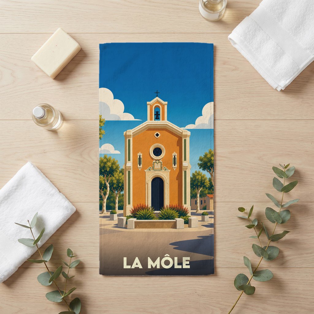 Serviette de bain souvenir de la ville de La Môle illustrée d'une église provençale stylisée.