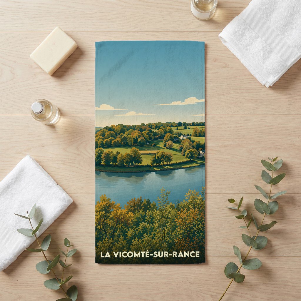 Serviette de bain souvenir de la ville de La Vicomté-sur-Rance avec une illustration de paysage bucolique.