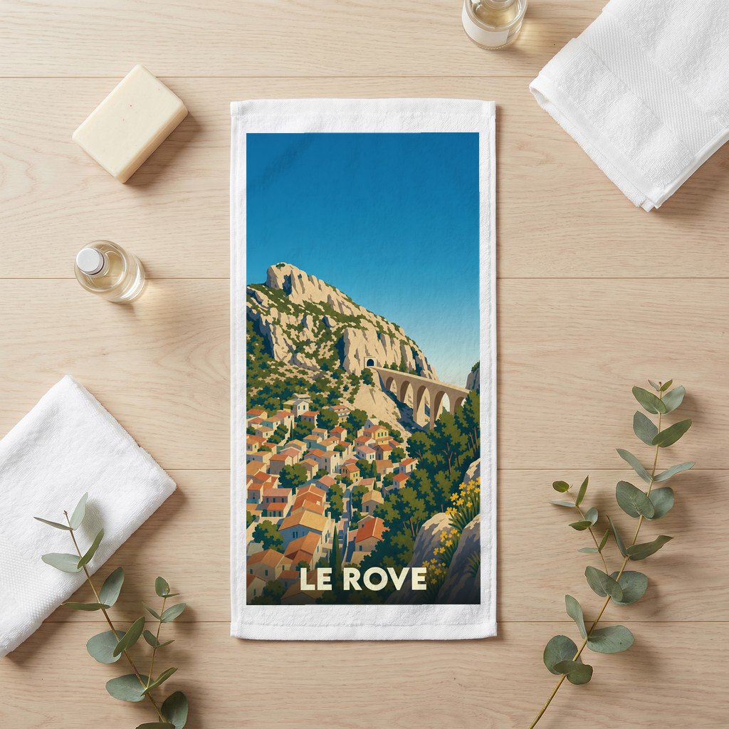 Serviette de bain souvenir de la ville du Rove avec une illustration stylisée d'un paysage provençal.