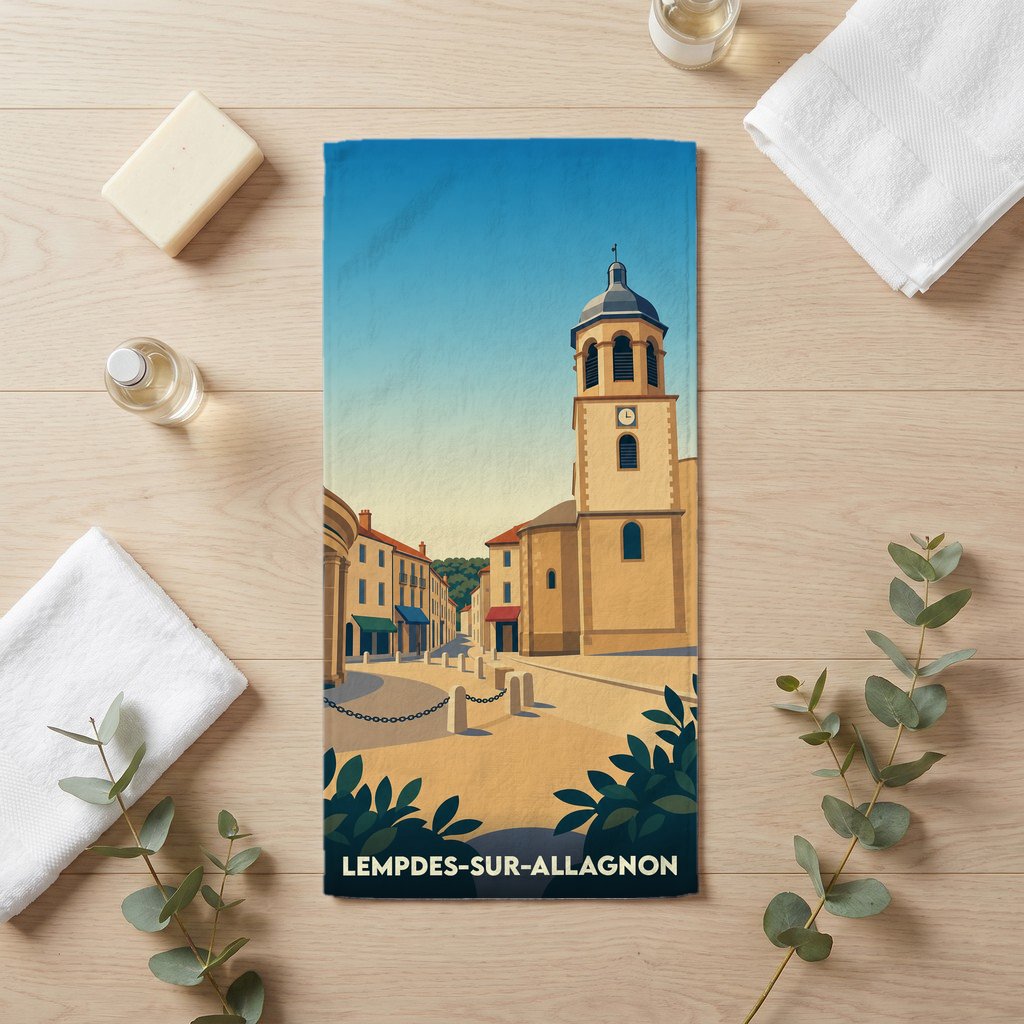 Serviette de bain souvenir de Lempdes-sur-Allagnon avec une illustration stylisée de son église et de ses rues.