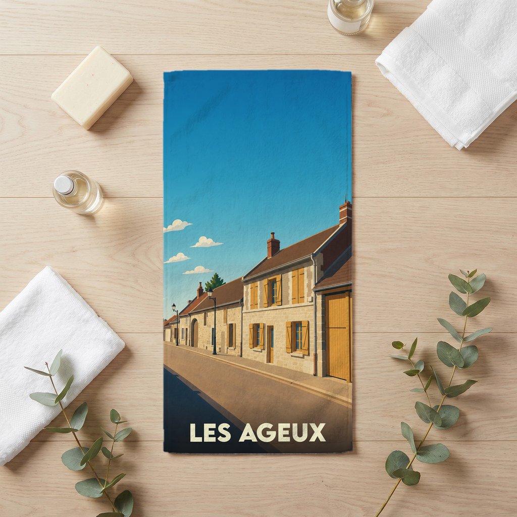 Serviette de bain souvenir de la ville de Les Ageux avec une illustration stylisée.