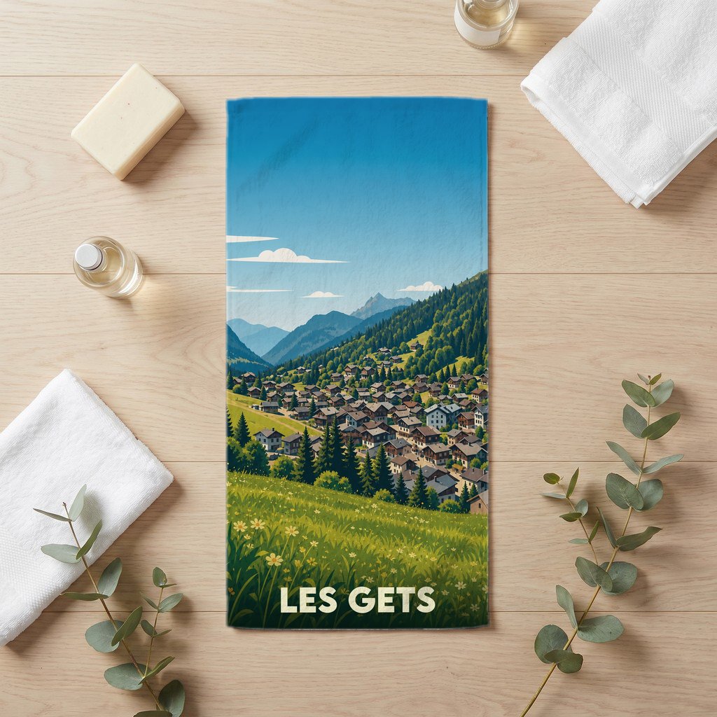 Serviette de bain souvenir de la ville de Les Gets avec une illustration stylisée de montagne.