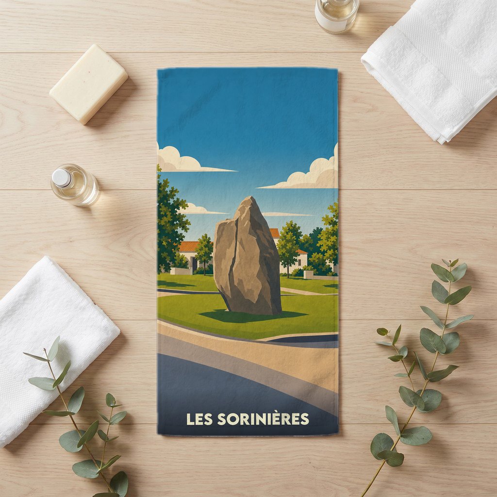 Serviette de bain souvenir de la ville de Les Sorinières avec une illustration stylisée d'un menhir.