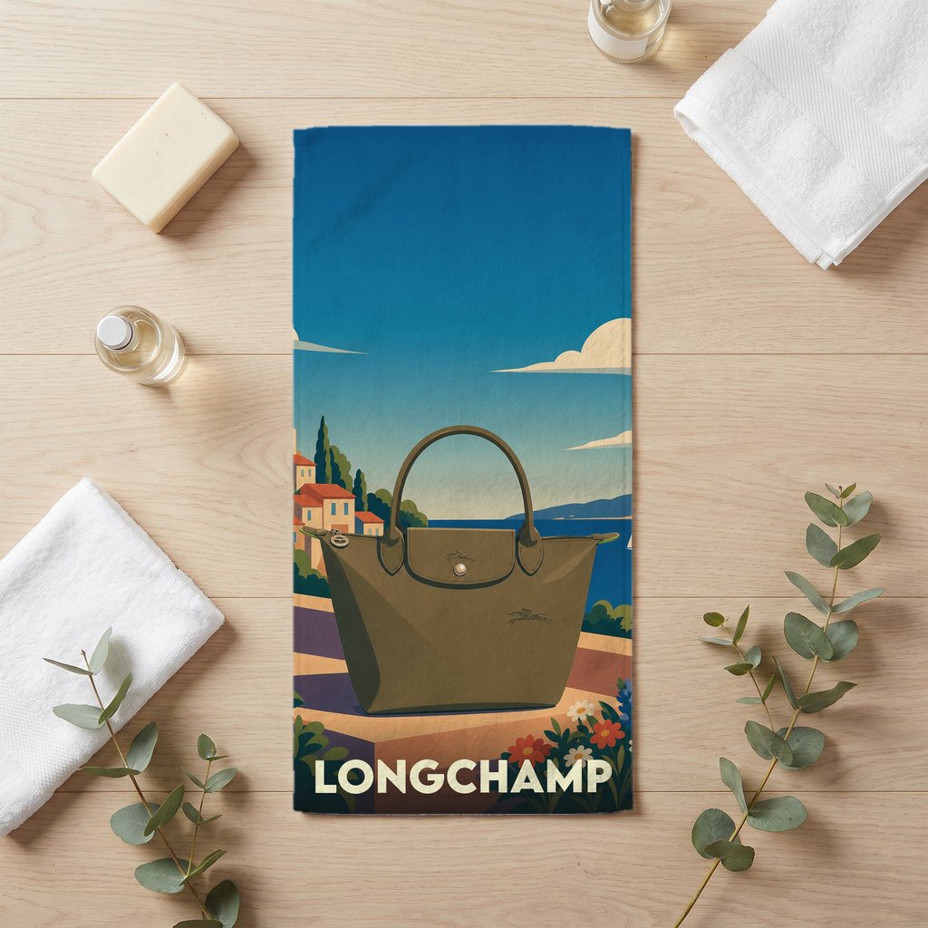 Serviette de bain souvenir de la ville de Longchamp avec une illustration stylisée.