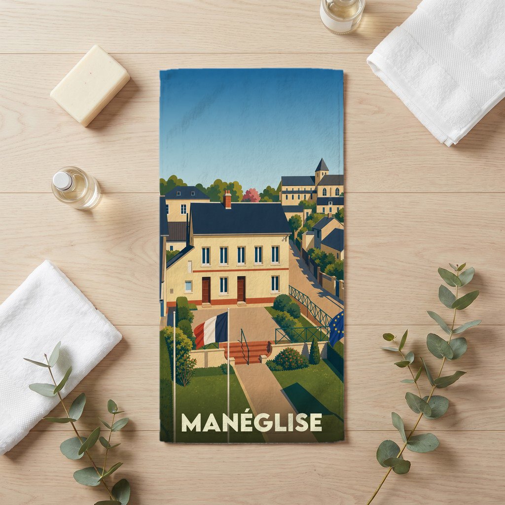 Serviette de bain souvenir de la ville de Manéglise avec une illustration stylisée.